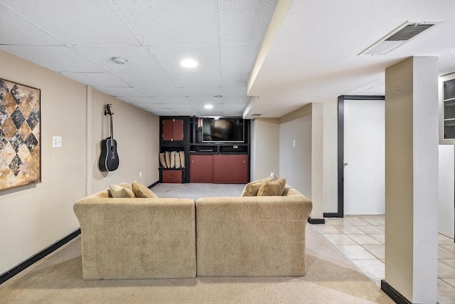 living room with recessed lighting, visible vents, light carpet, and baseboards
