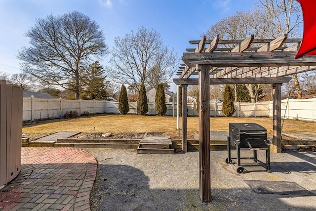 view of yard with a pergola, a fenced backyard, and a patio area
