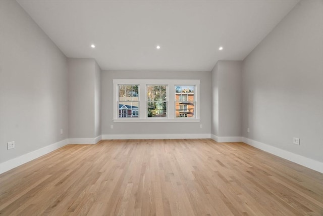 unfurnished living room with light wood-type flooring