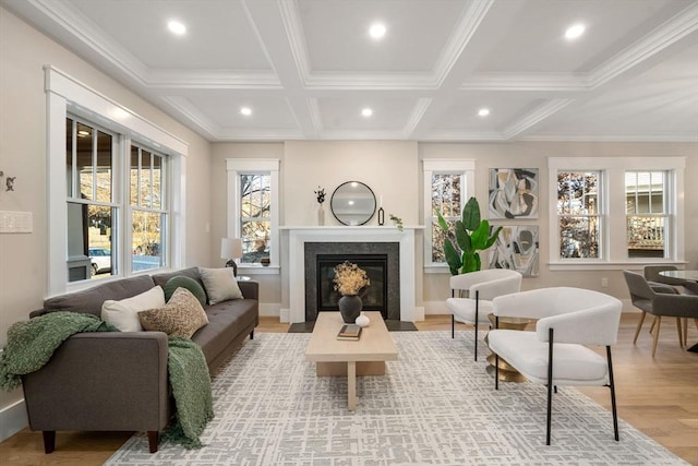 living room with beamed ceiling, coffered ceiling, and light wood-type flooring