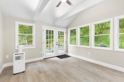 537 S River St, Marshfield, MA 02050 - unfurnished sunroom with french doors