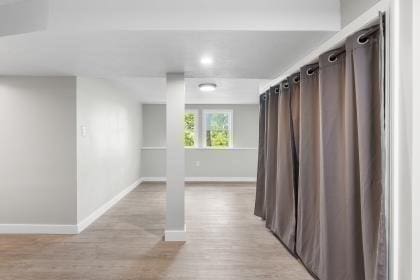 537 S River St, Marshfield, MA 02050 - below grade area with baseboards, light wood-type flooring, and recessed lighting