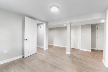 537 S River St, Marshfield, MA 02050 - finished below grade area with light wood finished floors and baseboards