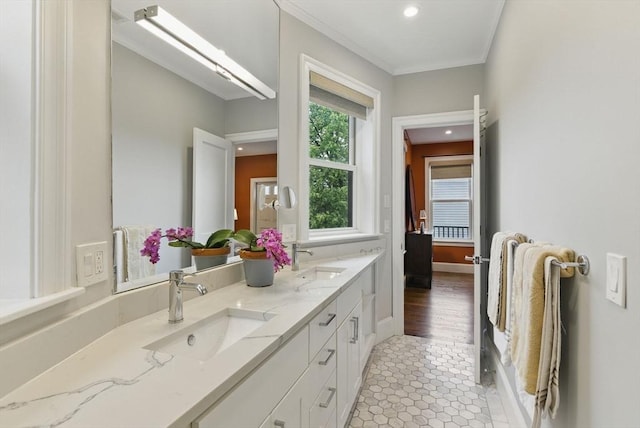 1650 Columbia Rd Unit 3, Boston, MA 02127 - bathroom featuring double vanity, tile patterned flooring, crown molding, and recessed lighting