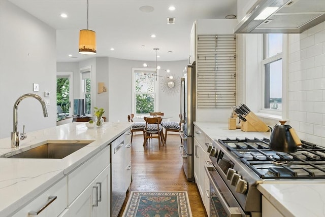 1650 Columbia Rd Unit 3, Boston, MA 02127 - kitchen featuring custom exhaust hood, appliances with stainless steel finishes, white cabinetry, recessed lighting, and dark wood-style flooring