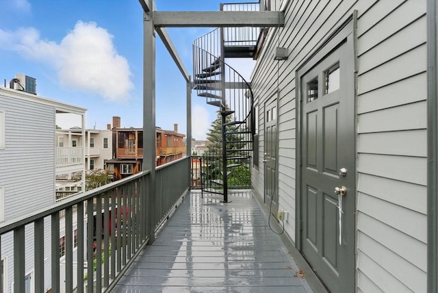 1650 Columbia Rd Unit 3, Boston, MA 02127 - balcony with stairs and a residential view