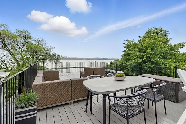 1650 Columbia Rd Unit 3, Boston, MA 02127 - wooden deck featuring a water view and outdoor dining space