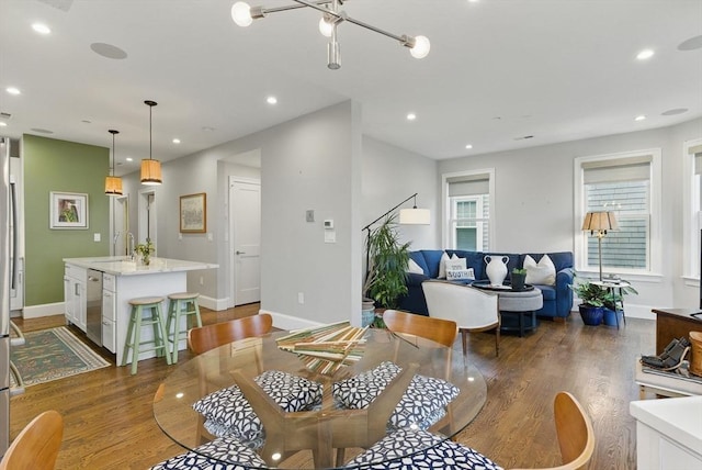 1650 Columbia Rd Unit 3, Boston, MA 02127 - dining area with dark wood-type flooring, recessed lighting, and a chandelier