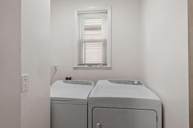 laundry room with laundry area and washer and dryer