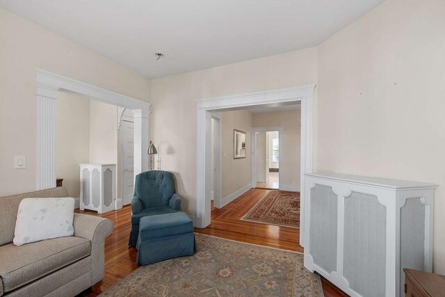 interior space featuring wood finished floors and baseboards