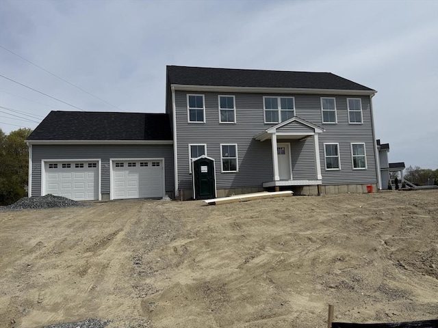 154 Tess Abigail Ln, Swansea, MA 02777 - colonial home with a garage and dirt driveway