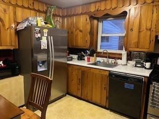 kitchen featuring black appliances and sink