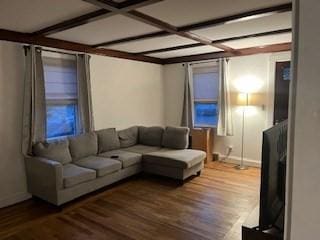 living room with beam ceiling, wood-type flooring, and coffered ceiling