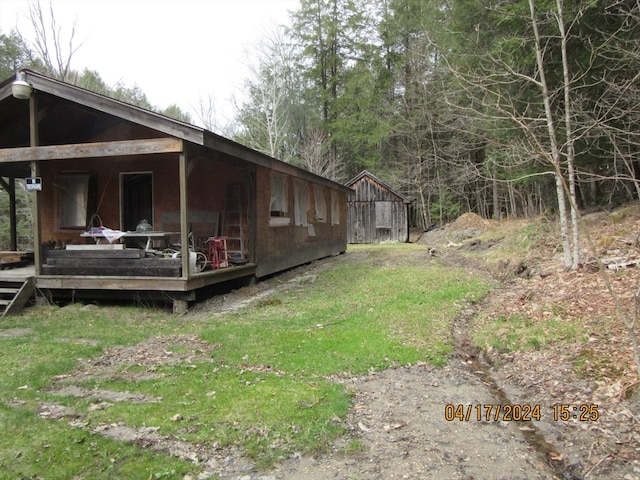 view of yard with a wooden deck