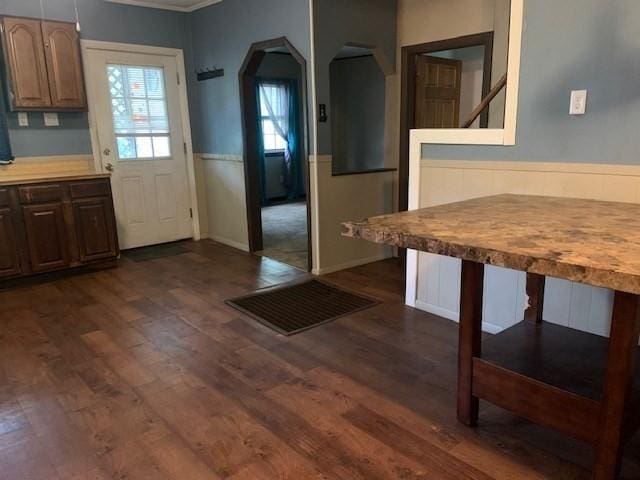 45-47 Middlefield Rd, Chester, MA 01011 - kitchen with arched walkways, dark wood finished floors, ornamental molding, and light countertops