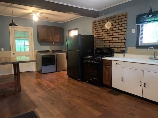 45-47 Middlefield Rd, Chester, MA 01011 - kitchen with black appliances, crown molding, washer and dryer, a ceiling fan, and a sink