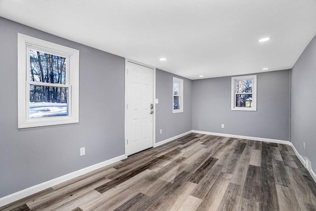 interior space with hardwood / wood-style floors