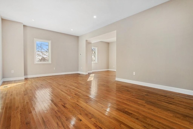 empty room with light wood-type flooring