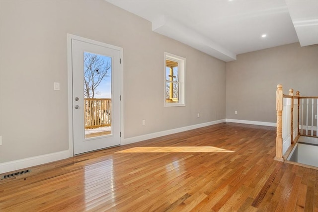 unfurnished room featuring light wood-type flooring