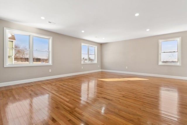 spare room with light wood-type flooring