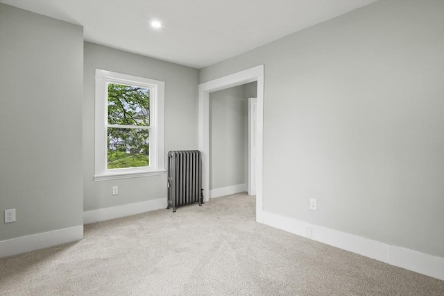 112 Brookline St, Worcester, MA 01603 - carpeted spare room featuring radiator and recessed lighting