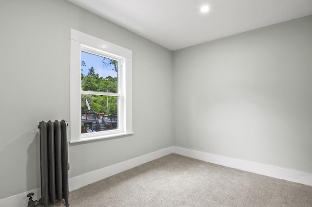 112 Brookline St, Worcester, MA 01603 - empty room with radiator, carpet flooring, and recessed lighting
