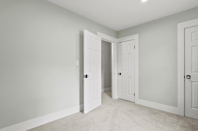 112 Brookline St, Worcester, MA 01603 - unfurnished bedroom featuring light carpet and baseboards
