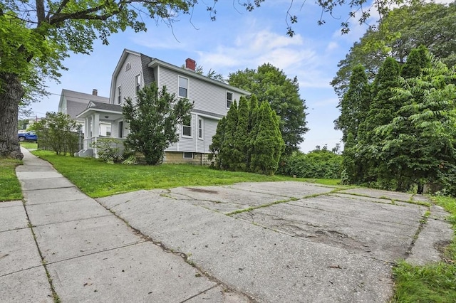 112 Brookline St, Worcester, MA 01603 - view of side of property featuring a chimney and a lawn