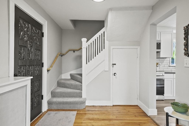 112 Brookline St, Worcester, MA 01603 - foyer with stairway and light wood-style flooring