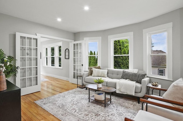112 Brookline St, Worcester, MA 01603 - living area with french doors, light wood-type flooring, and recessed lighting