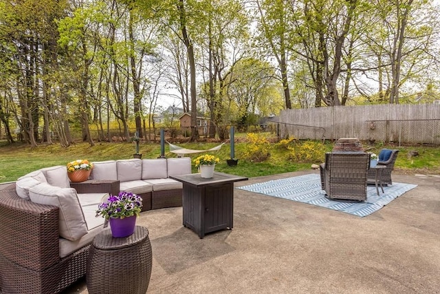 view of patio / terrace with outdoor lounge area, a fenced backyard, and outdoor dining space
