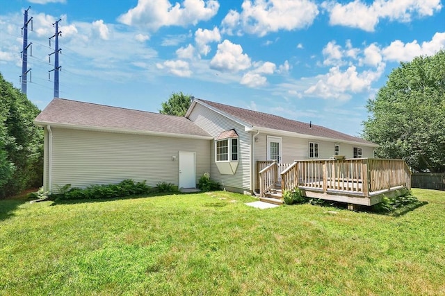 16 Amherst St, Chicopee, MA 01013 - back of house featuring a deck and a yard