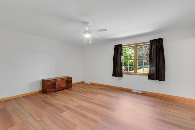 16 Amherst St, Chicopee, MA 01013 - empty room with light wood-style flooring and ceiling fan