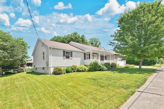 16 Amherst St, Chicopee, MA 01013 - ranch-style home featuring covered porch, a front yard, and an attached garage