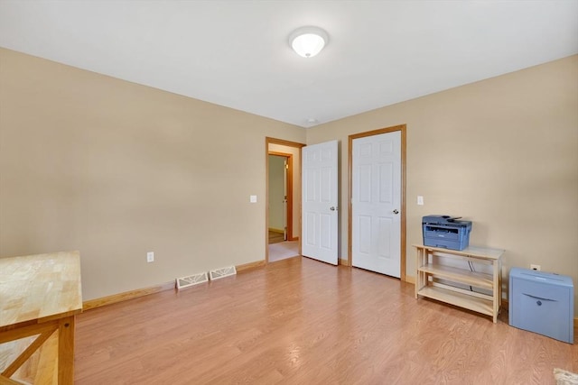 16 Amherst St, Chicopee, MA 01013 - unfurnished room with wood finished floors and baseboards