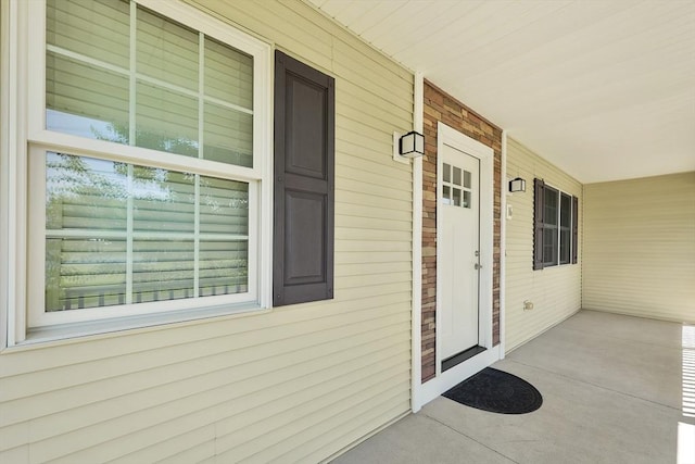 16 Amherst St, Chicopee, MA 01013 - view of exterior entry with a porch