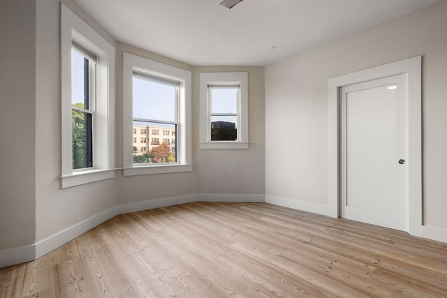 empty room with light wood-type flooring