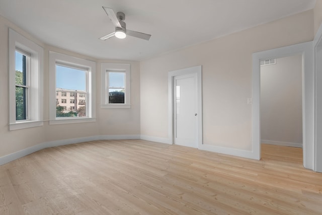 interior space with light wood-type flooring and ceiling fan