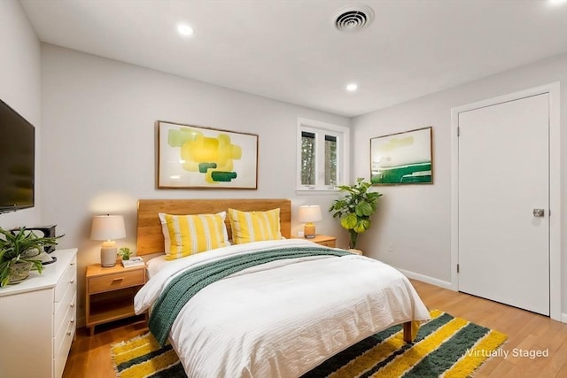 bedroom featuring light hardwood / wood-style floors