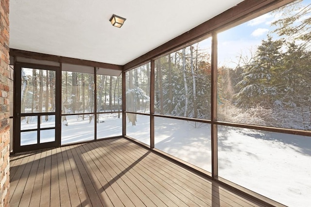 unfurnished sunroom with a healthy amount of sunlight