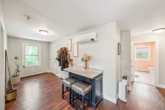 interior space with radiator, dark hardwood / wood-style flooring, a baseboard heating unit, and a wall mounted air conditioner