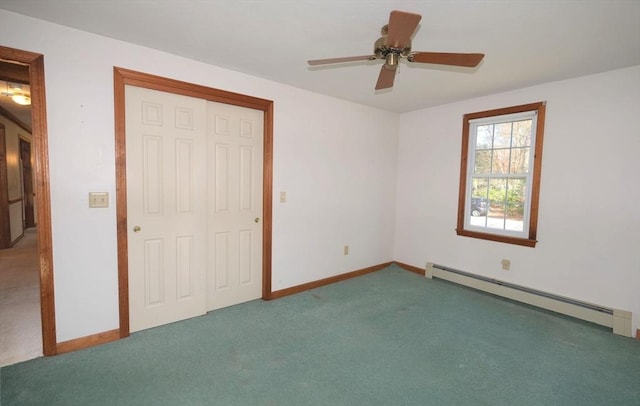 unfurnished bedroom with a ceiling fan, baseboards, a closet, a baseboard heating unit, and carpet