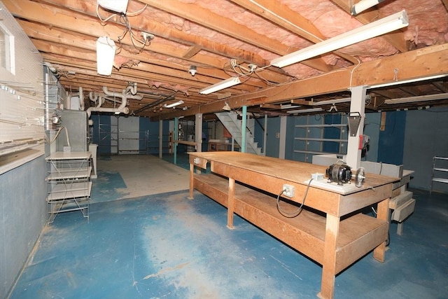 unfinished basement with stairway