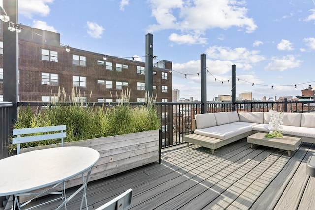 deck featuring outdoor lounge area