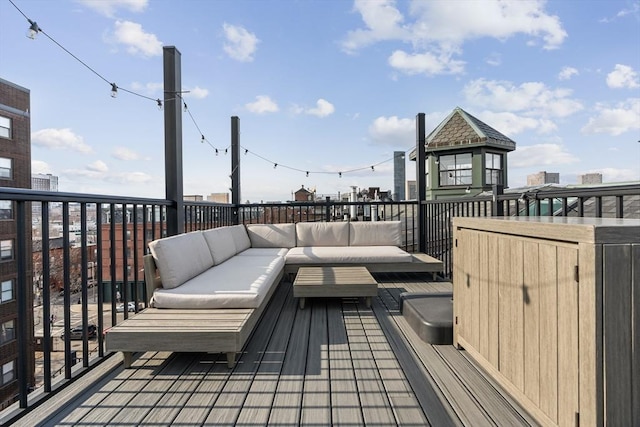 wooden deck with an outdoor hangout area