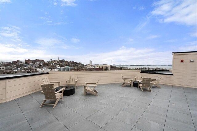 view of patio with an outdoor fire pit