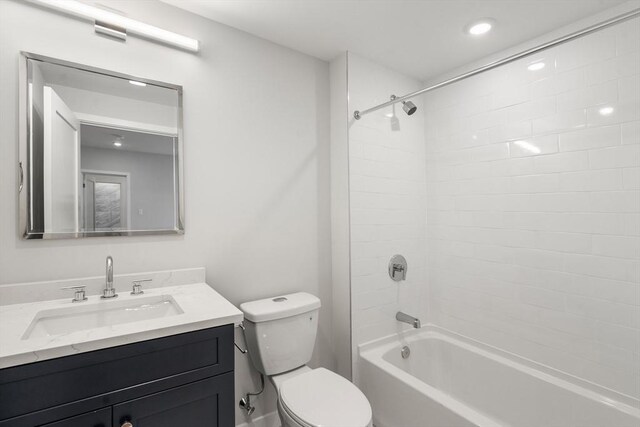 full bath with toilet, recessed lighting, tub / shower combination, and vanity