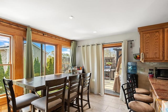 dining space with recessed lighting