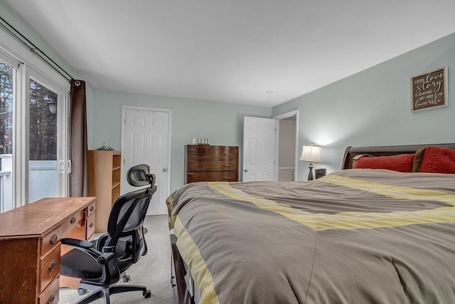 bedroom featuring light colored carpet