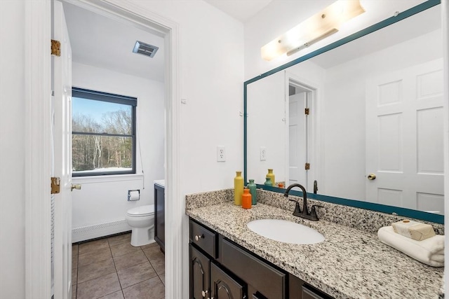 bathroom featuring visible vents, toilet, tile patterned floors, vanity, and a baseboard radiator